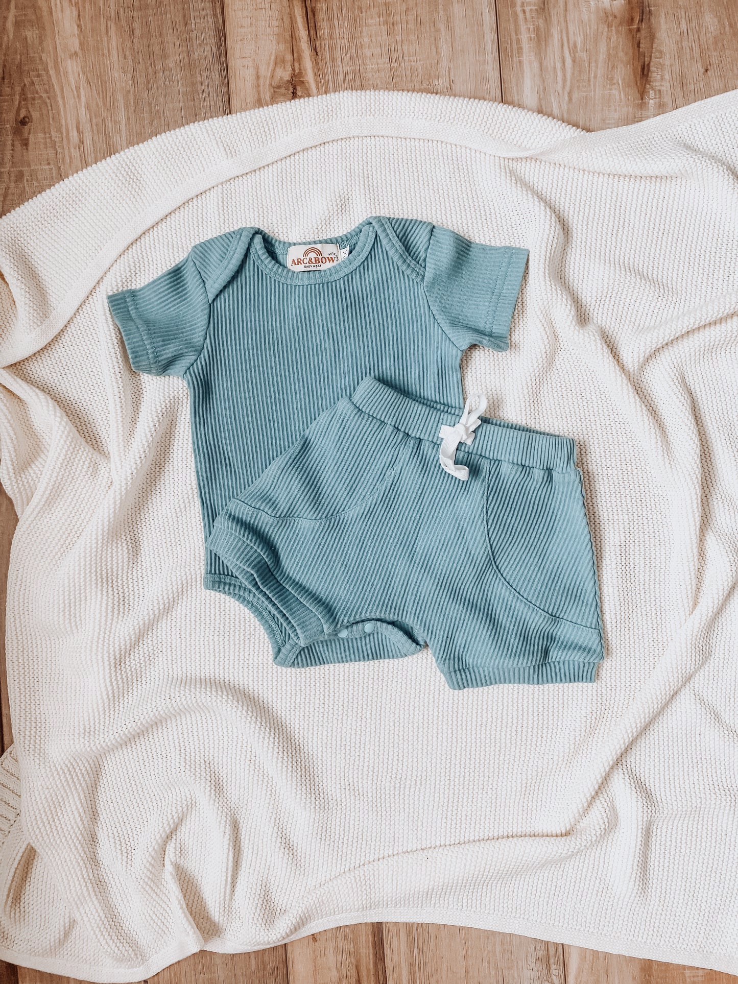 Sky blue short sleeve onesie