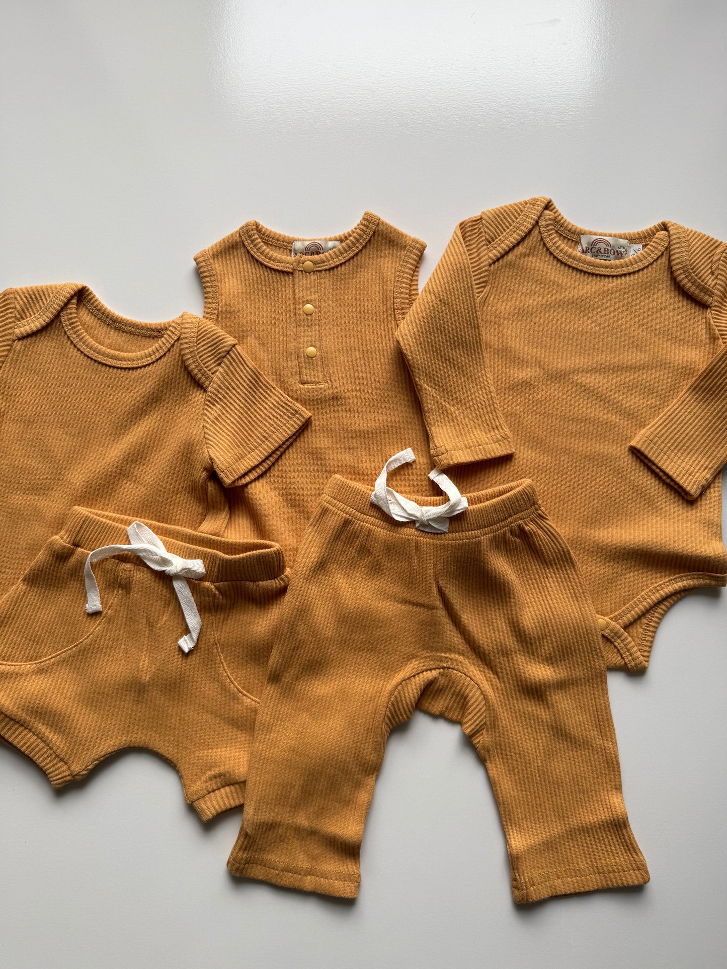 Orange short sleeve onesie